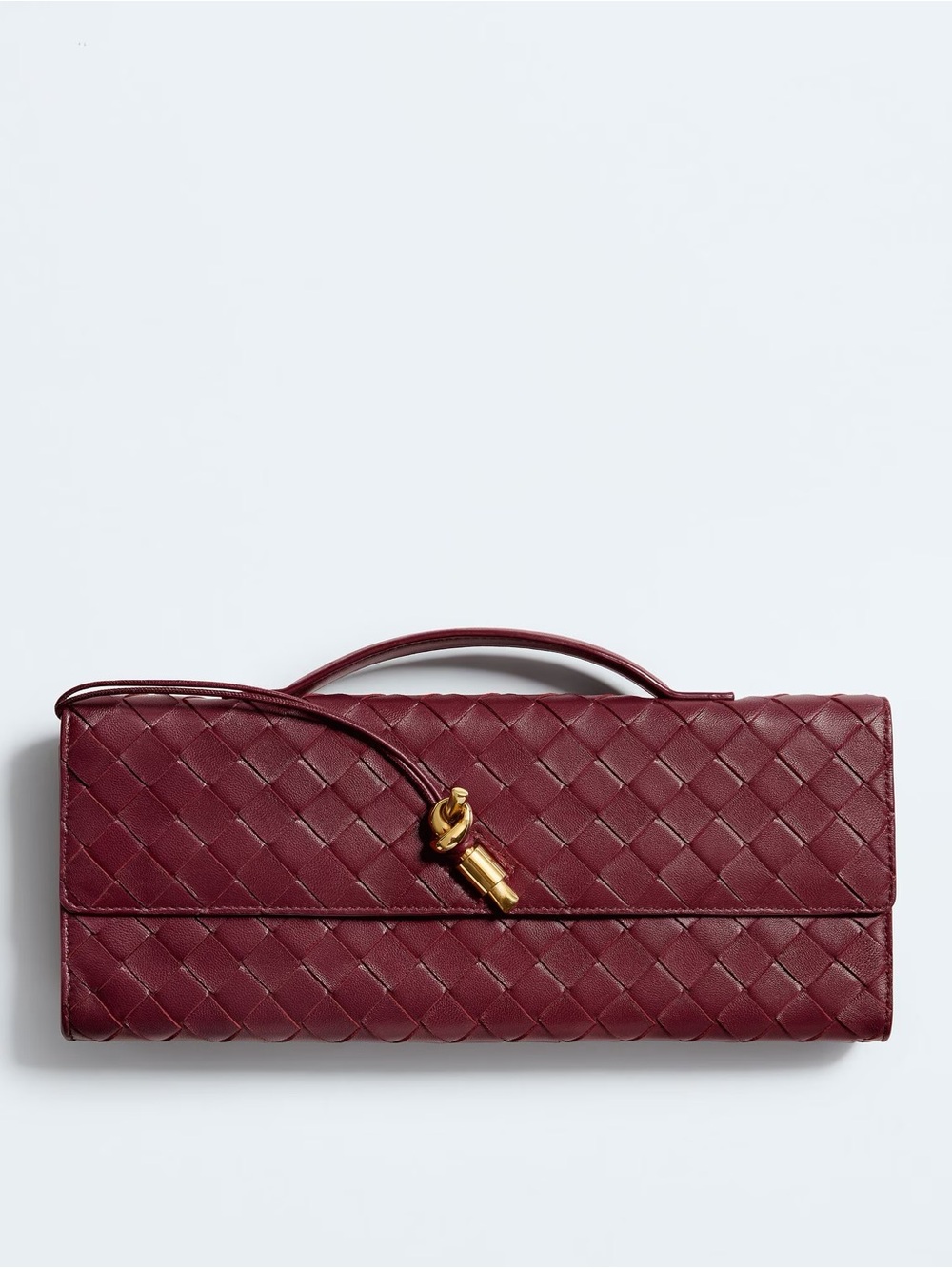 Original Bottega Veneta Clutch in Burgundy with Gold Hardware